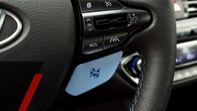 The performance enhancing buttons on the steering wheel inside of the Hyundai N models.