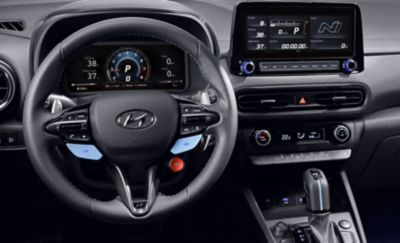 Leather steering wheel with the N Grin Shift button inside the Hyundai KONA N hot SUV