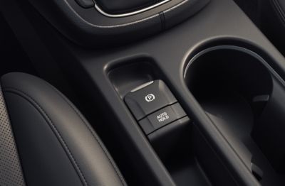 The electric parking brake in the centre console of the new Hyundai Kona Hybrid compact SUV.