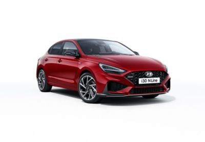 The new Hyundai i30 Fastback pictured from the passenger side front.