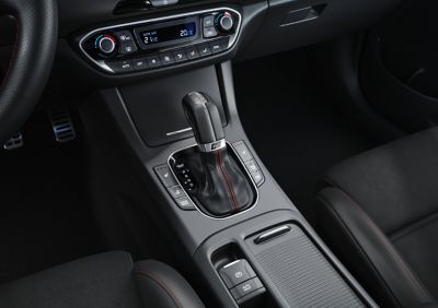 Front interior of the new Hyundai i30 as seen from the back seat.