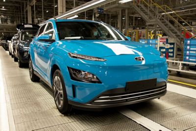 A Hyundai KONA Electric SUV shown in the factory.