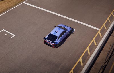 Hyundai RN22e all electric rolling lab driving on a track see from above.