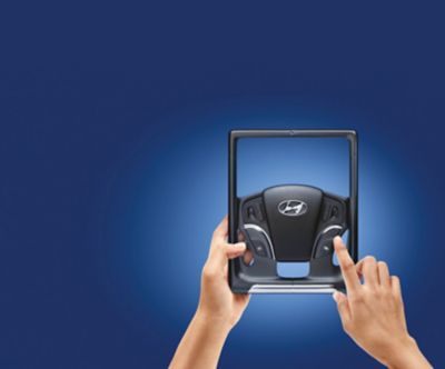 Immagine iconizzata con mani che reggono un volante rappresentante lo Hyundai Service Online Booking