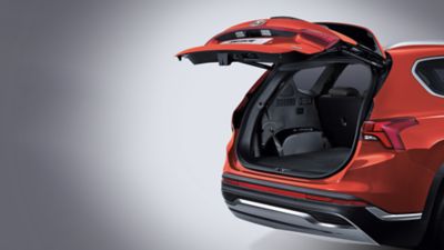 The open smart power tailgate of the new Hyundai Santa Fe 7 seat SUV.