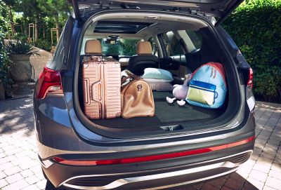 The fully loaded trunk of the Hyundai Santa Fe Hybrid 7 seat SUV.