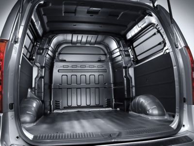 The cargo area of the Hyundai H-1 Van opened up.