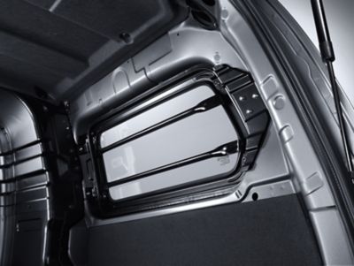 Protection bars on the windows of the cargo room of the Hyundai H-1.