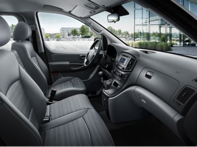 The Hyundai H-1 Van cockpit on a plaza. 