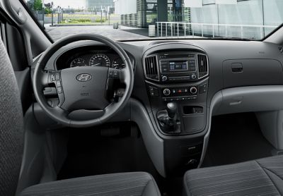 The cockpit of the Hyundai H-1 Van.