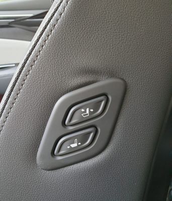 Buttons to slide and recline the front passenger seat of the Hyundai TUCSON Plug-in Hybrid. 