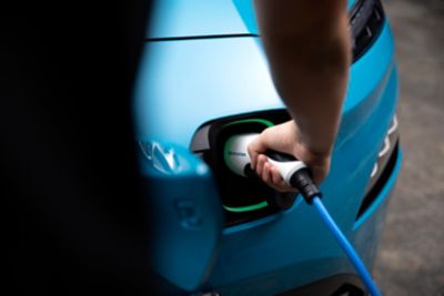 The Hyundai Kona Electric getting charged.