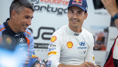 Hyundai Motor sport driver Dani Sordo and co-driver Cándido Carrera smiling.