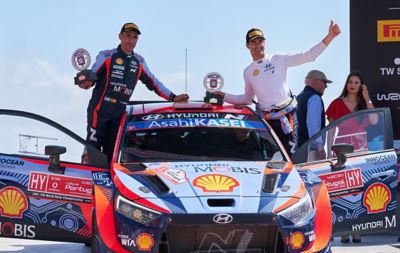 Hyundai Motorsport driver Dani Sordo and his co-driver Cándido Carrera celebrating after a race.