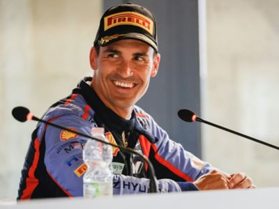 Close-up of Hyundai Motorsport driver Dani Sordo smiling.