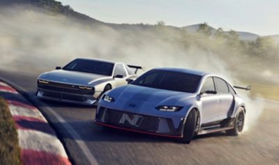 Hyundai RN22e and N Vision 74 high-performance N electric vehicle rolling laps on the track.