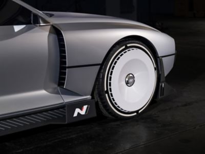 Close up of front white alloy wheel Hyundai N Vision 74 concept car.