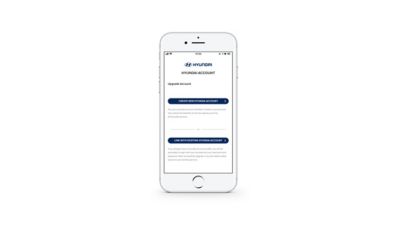 schermata dell'app Hyundai Bluelink che mostra la scelta tra creare un nuovo account o collegarlo con uno già esistente