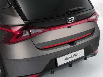 Tailgate trim line on a Hyundai i20 in tomato red.