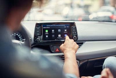 Photo of the touch screen in the dashboard of a Hyundai car.