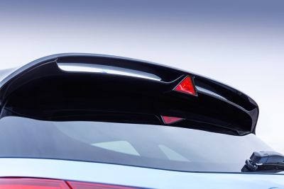 Rear spoiler and triangular brake light of the Hyundai i30 N performance hatchback.