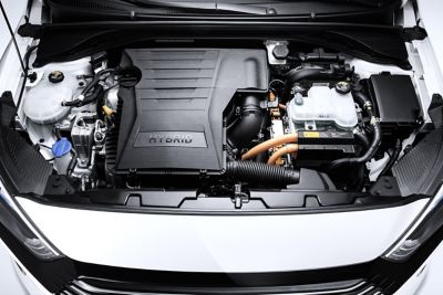 The combination of internal combustion engine and electric motor for a Hyundai Hybrid.