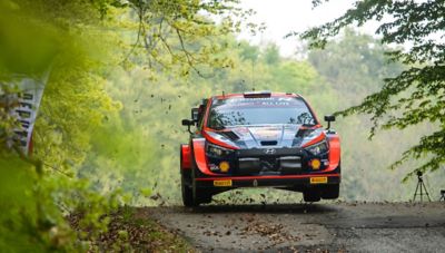 Hyundai Motorsport driver Oliver Solberg's i20 N WRC Rally1 in air.