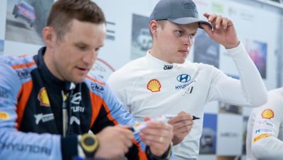 Hyundai Motorsport driver Ott Tänak and and co-driver Martin Järveoja at a press conference.