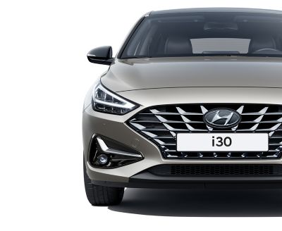 The Hyundai i30 pictured from the front, highlighting its new headlamp design.