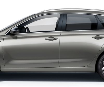 The Hyundai i30 Wagon pictured from the driver side, focused on the doors roof, windows, and doors