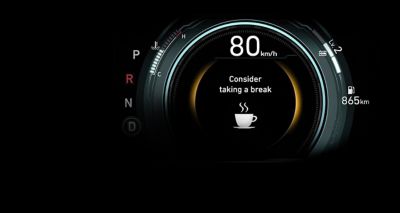 The driver attention warning showing in the cluster of the Hyundai IONIQ Hybrid.