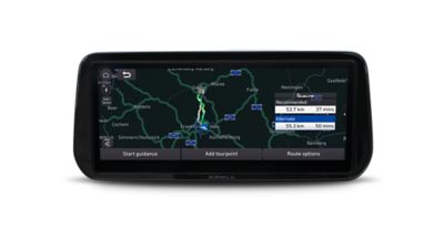 Close-up of the all-new Hyundai Santa Fe AVN touchscreen with navigation system on screen