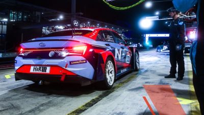 The Hyundai Motorsport’s i30 N TCR in the pit lane pictured from the rear.