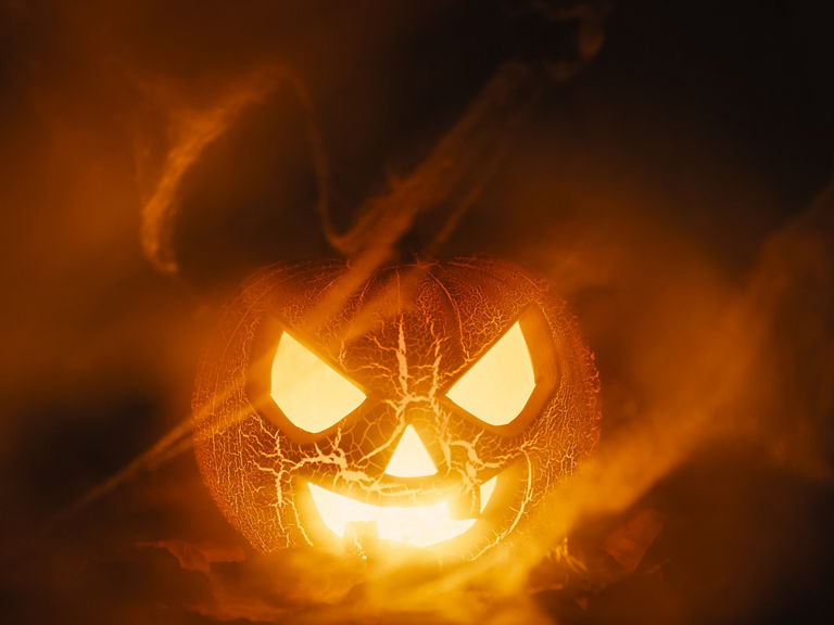 Orange Halloween pumpkin on fire 