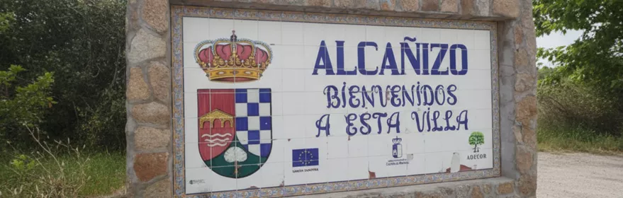 Panel cerámico de bienvenida a la localidad junto al camino