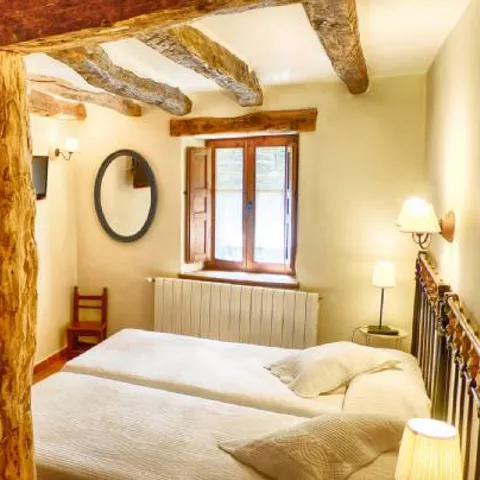 vista desde el fondo de la Habitación doble con baño privado el tejo