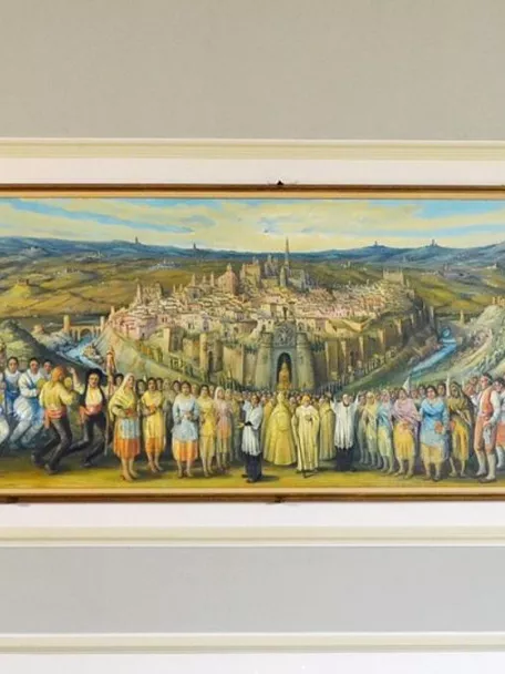 Gran mural con ciudad al fondo y personas en primer plano