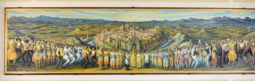 Gran mural con ciudad al fondo y personas en primer plano