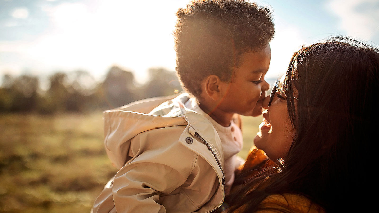 Multi-ethnic mother and son outdoors.jpg