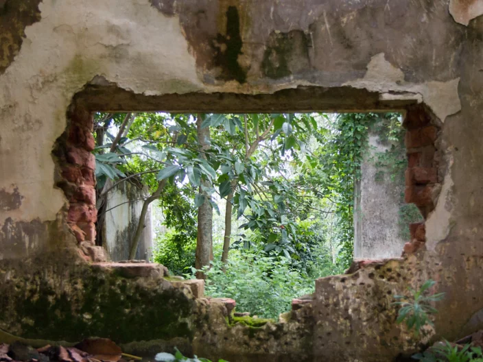 Ssezibwa, Uganda. 23 April 2017. A hole (a former window) in a ruined house.