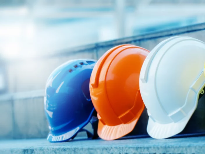 Multicolored Safety Construction Worker Hats. Teamwork of the construction team must have quality. Whether it is engineering, construction workers. Have a helmet to wear at work. For safety at work.