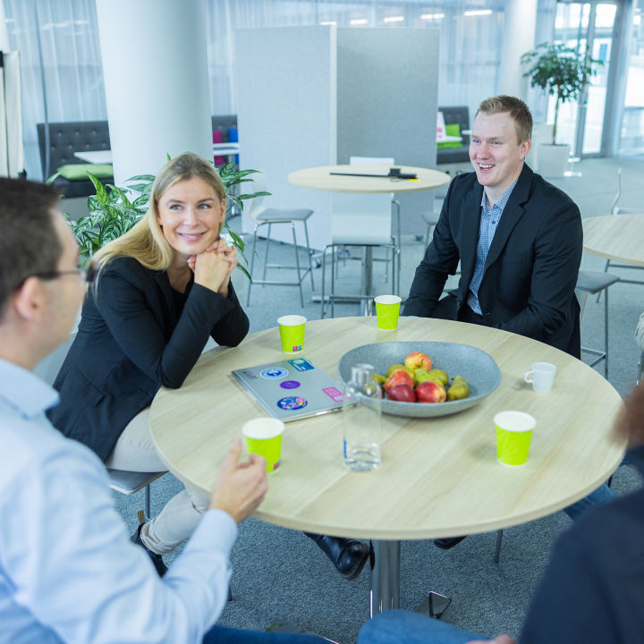 KONE employees discussing