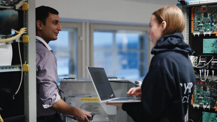 Two cybersecurity experts having a conversation.