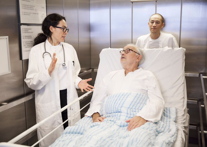 Botón de alarma de un elevador KONE