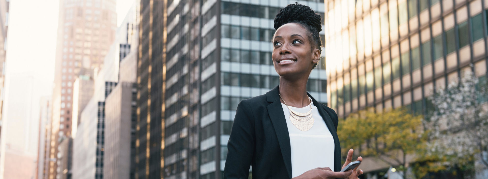 Women-walking-next-to-high-rise-buildings