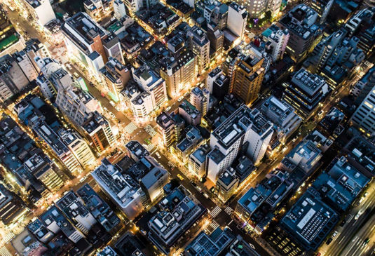 A birdseye view of a city at night.