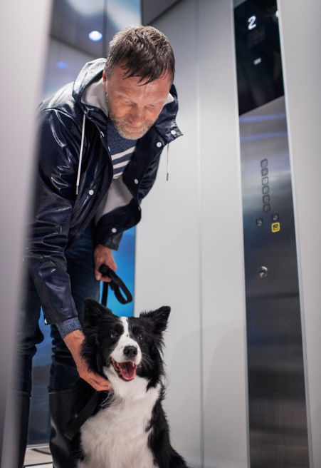 KONELaunchManwithDog:451x656%2811-16%29