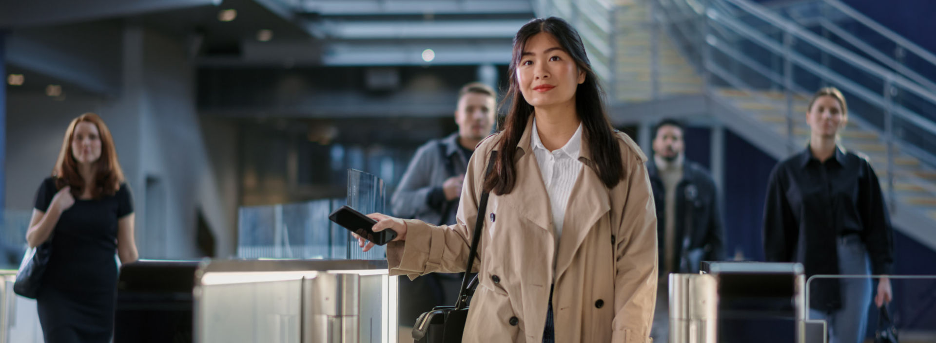 young woman using a turnstile