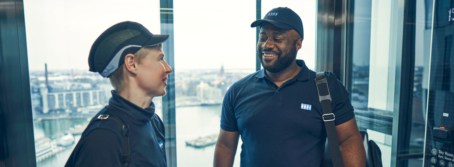 KONE maintenance technicians in hotel elevator