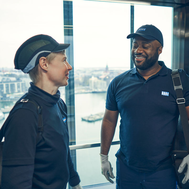 KONE maintenance technicians in hotel elevator